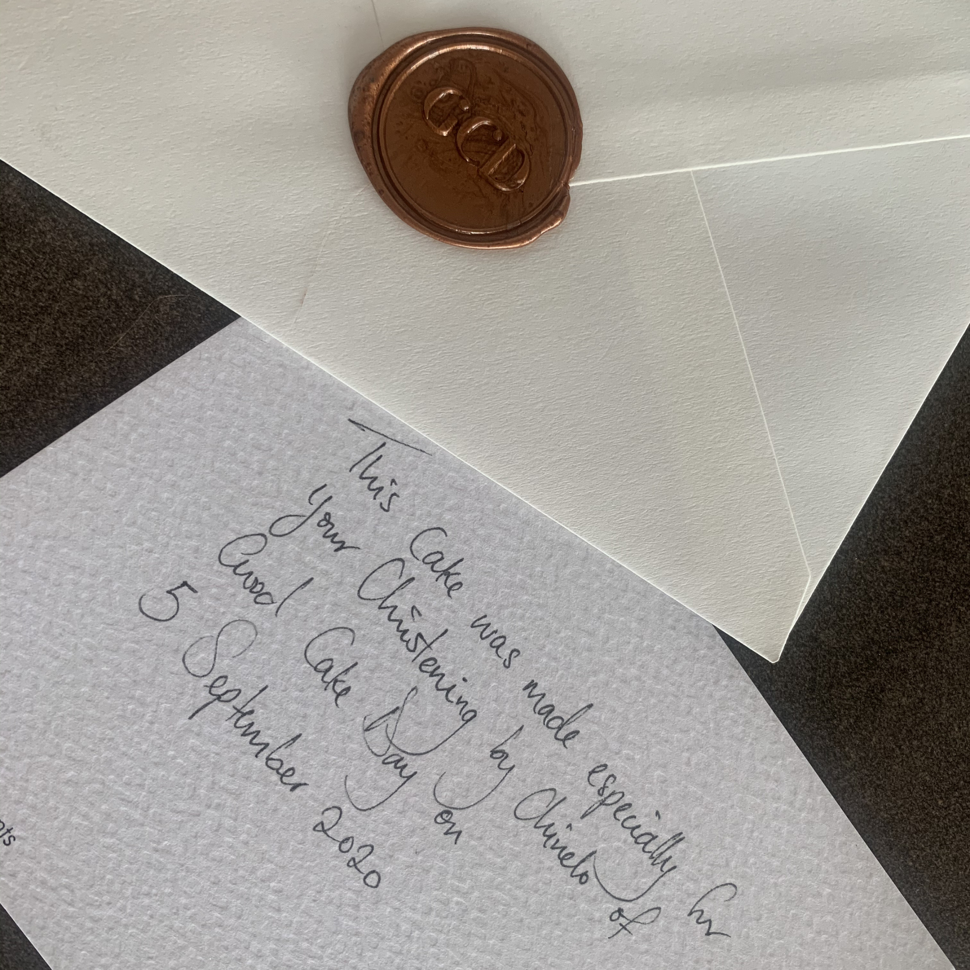 Good Cake Day handwritten personalised message on a textured BLUSH card with a cream wax sealed enveleope