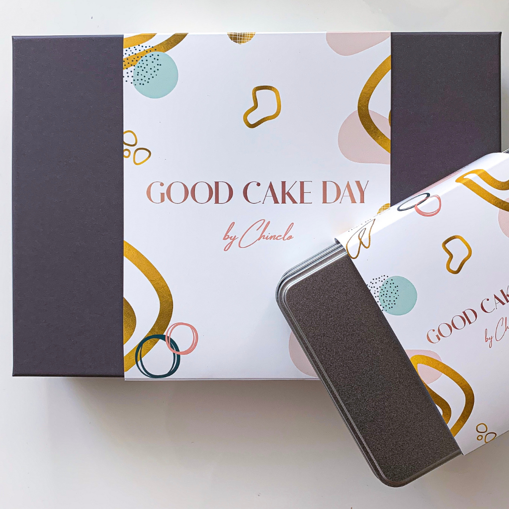 Good Cake Day airtight tin with Good Cake Day tin sleeves and grey luxury brownies box with branded box sleeve