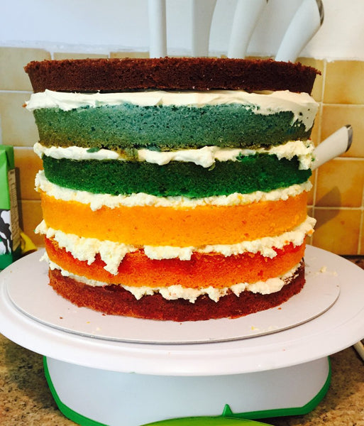 Rainbow birthday cake.. With a helping of butterflies